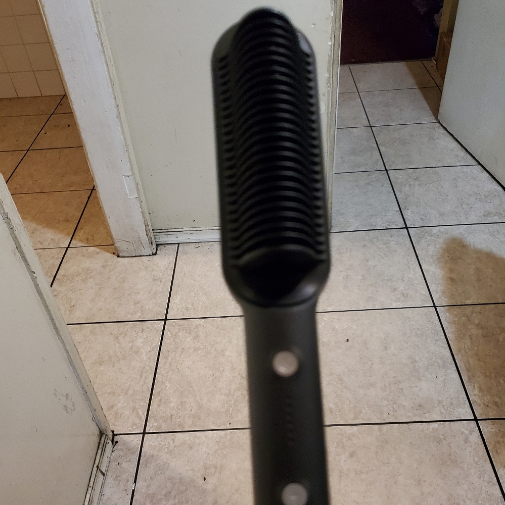 Hair straighter w/wire cord brand new open box. Retail price$60 new release item